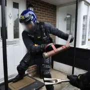 43 Arrested in Salford Police Raids: Cannabis Farm, Tasers, Firearm Seized