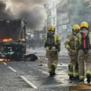 Belfast Knife Attack Sparks Disorder: Bus and Vehicles Torched
