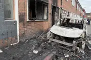 Belfast Knife Attack Suspect Charged as Racist Violence Erupts