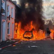 Belfast Knife Attack Victim Identified; Protester Arson Erupts