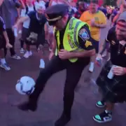 Boston Cop's Keepy-Uppy Skills Win Over Scotland Fans at World Cup