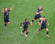 Canada reach World Cup last 16 for first time with stoppage-time win over South Africa