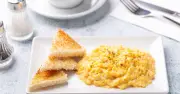 Creamier Scrambled Eggs: Ditch Milk for This Fridge Ingredient