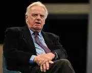 Ex-Ofcom Chair Michael Grade Defends GB News Against Impartiality Claims