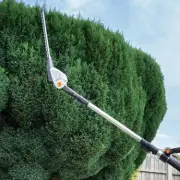 Extendable Hedge Trimmer Makes Cutting Tall Bushes Easier Without Ladder