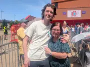 Foo Fighters Fans Leave Queue at Anfield as Temperatures Soar in Liverpool