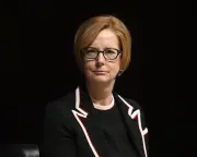 Gillard Slams 'Ditch the Witch' Billboard; Scolyer Dies at 59