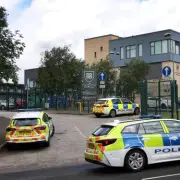 Girl, 14, charged with attempted murder after Manchester school stabbing