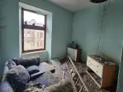 Glasgow Flat with Pigeon Poo and Hole in Ceiling for Sale at £15,000
