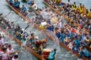 Global Photos: Dragon Boat Festival, Cranes, Heatwave, and More