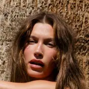 Hailey Bieber Sizzles in Candy Pink Bikini for Calzedonia Campaign
