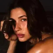 Hailey Bieber Sizzles in Sand-Filled Swimsuit Campaign for Rhode