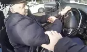 Handcuffed Robber Speeds Off from Police in Botched Getaway