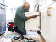 Home Renovator Discovers 40-Year-Old Packet of Crisps Behind Kitchen Unit