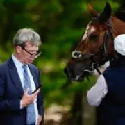 Horse racing trainer Jamie Osborne banned for photographing woman's bottom