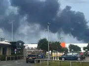 Huge fire at Cheshire warehouse sends black smoke into sky
