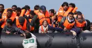 Hundreds more migrants cross Channel as Labour's migrant deal faces new farce