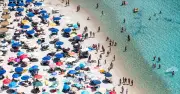Italy's Sardinia Beach Bans Umbrellas for Ages 10-65 After Arson Fire