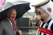 King Charles Braves Rain to Meet Football Mascot in Grimsby Visit