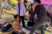 Laos Cave Survivors Aid Search for Two Missing Men