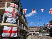 London's Most Patriotic Estate Rallies for England's World Cup Opener