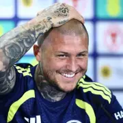 Lyndon Dykes Urges Scotland Teammates to Join World Cup Tattoo and Skinhead Pact