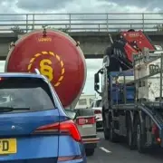 M58 Closed Eastbound After Bus Fire and Spillage Causes Delays