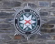 Man Arrested After PSNI Officer Struck by Stolen Police Car in Downpatrick