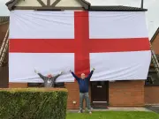 Man Covers House in Giant England Flag for World Cup Fever