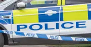 Man Critical After Fall from Salford Tower Block, Two Arrested