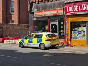 Man Shot in Lodge Lane Café, Police Launch Investigation