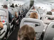 Man Teaches Entitled Passenger a Lesson on Plane by Switching Seats with Wife