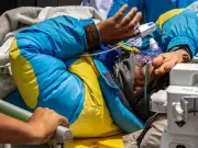 Missing Everest Guide Found Crawling on Frostbitten Limbs as Family Held Funeral