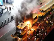New York Chaos: Shots Fired, Bus Torched in Times Square After Knicks Win