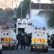NI Police Use Water Cannon on Rioters After Belfast Stabbing