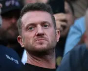 Police Stop Tommy Robinson on Return to London from Russia