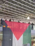 Pro-Palestine Protesters Rally at London Waterloo Station During Rush Hour