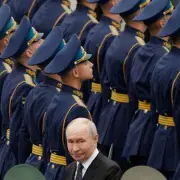 Putin's Droopy Face at Memorial Sparks Health Rumours