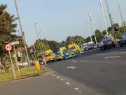 Queens Drive Closed After Ambulance Crash Emergency Services at Scene