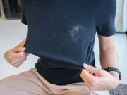 Remove Fluff and Pet Hair from Clothes Using a Wet Wipe in the Washing Machine