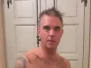 Robbie Williams Strips to Pants as England Wins World Cup Opener