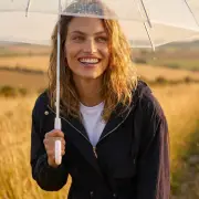 Roman's Stylish Raincoat a Hit with UK Shoppers for Summer Showers