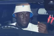 Stormzy fined £533 for using phone while driving Ferrari