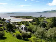 Stunning Barn House Steps from Hidden Gem Sandy Beach Hits Market