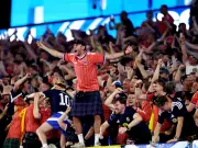 Tartan Army Adopts Boston Dog Toby as New Mascot in Viral Video