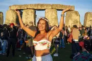 Thousands gather for summer solstice as UK braces for record-breaking heatwave