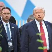 Trump Struggles with Chair at G7 Summit Before Carney Offers Seat