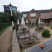 UK pub's beer garden offers 'best spectator sport' watching cars cross narrow bridge