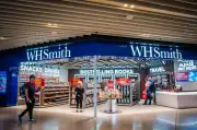 WH Smith warns on profit, plans equity raise amid airport dip
