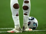Why England Footballers Cut Holes in Their Socks Explained